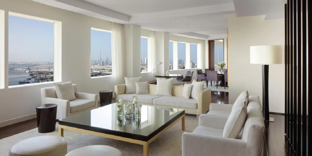 Suite lounge at InterContinental Dubai Festival City with skyline and creek views